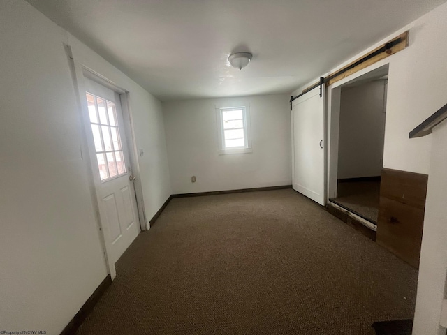 interior space featuring a barn door