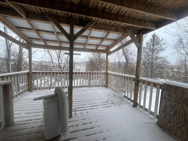 view of snow covered deck