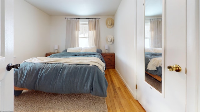 bedroom featuring hardwood / wood-style floors