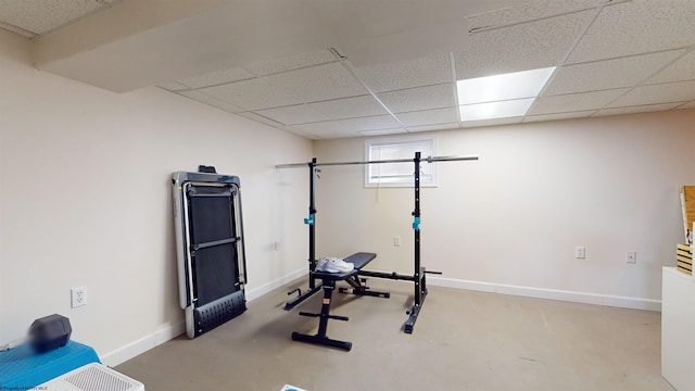 exercise room with a drop ceiling