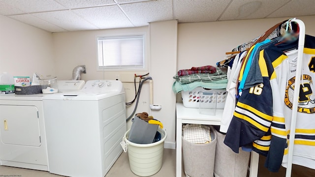 laundry area with independent washer and dryer