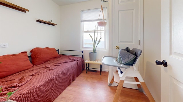 bedroom featuring light hardwood / wood-style floors