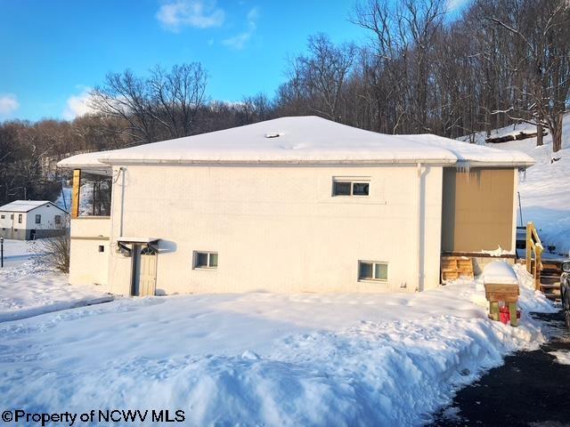 view of snow covered property