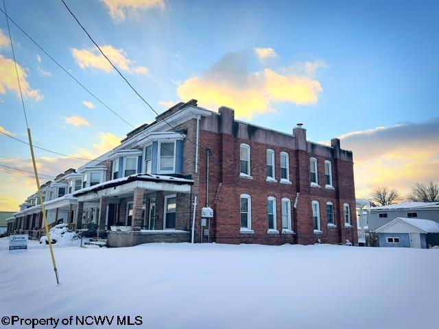 view of snow covered property