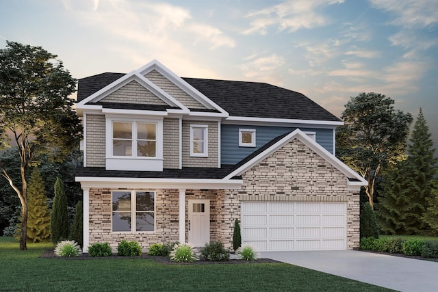 view of front of house with a garage and a front yard