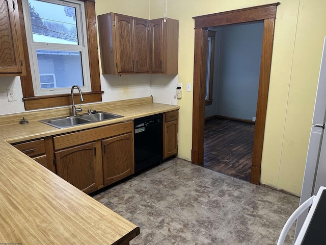 kitchen with sink and black dishwasher