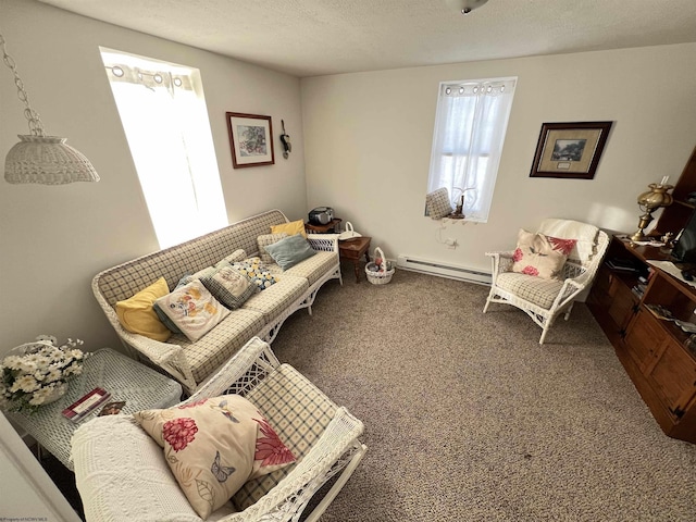 living room featuring a baseboard radiator, carpet, and a textured ceiling