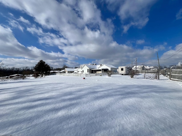 view of yard covered in snow