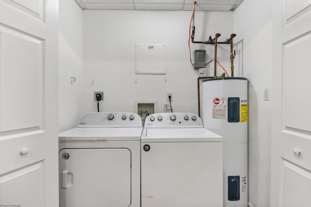 laundry area featuring separate washer and dryer and electric water heater