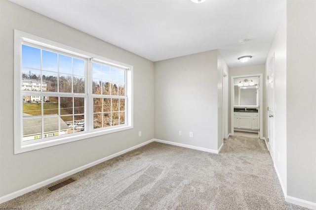 view of carpeted spare room