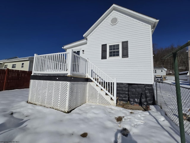 rear view of house with a deck