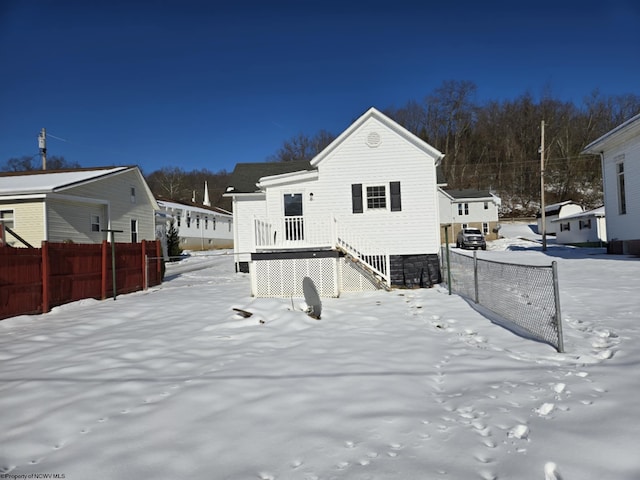 view of snow covered property