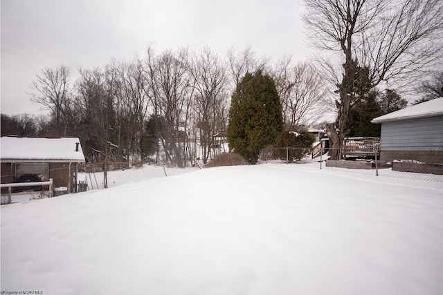 view of yard covered in snow