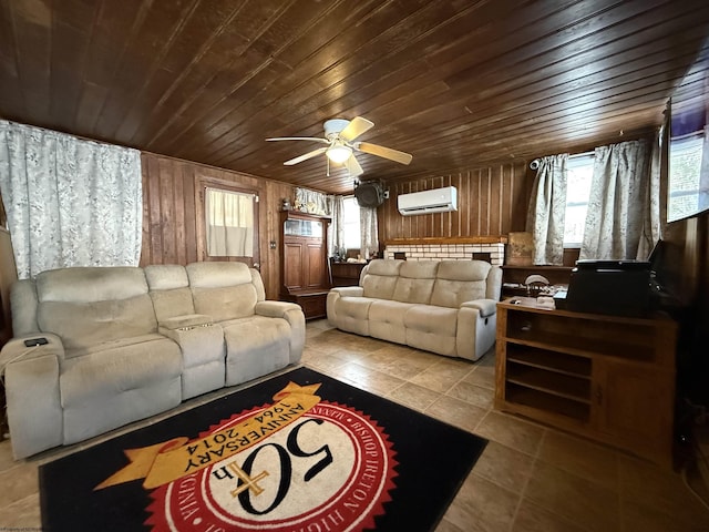 living room featuring wood ceiling, ceiling fan, a wall mounted air conditioner, light tile patterned flooring, and wood walls