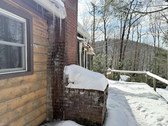 view of snow covered property