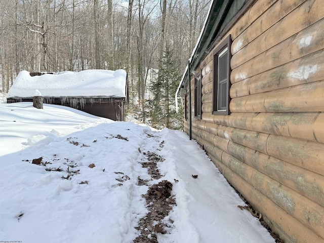 view of snow covered property