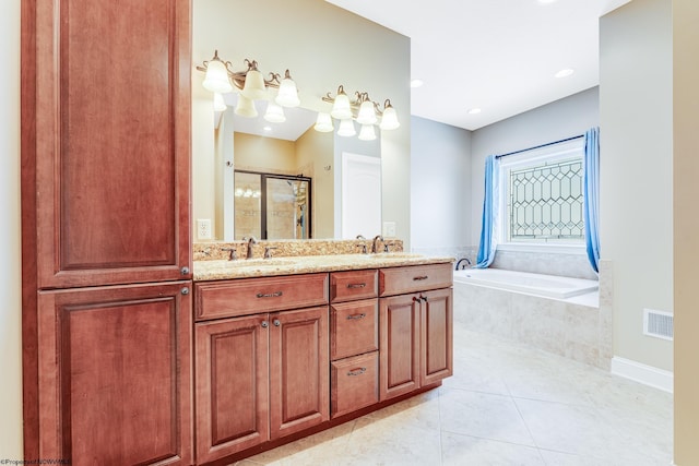 bathroom with vanity, tile patterned flooring, and independent shower and bath