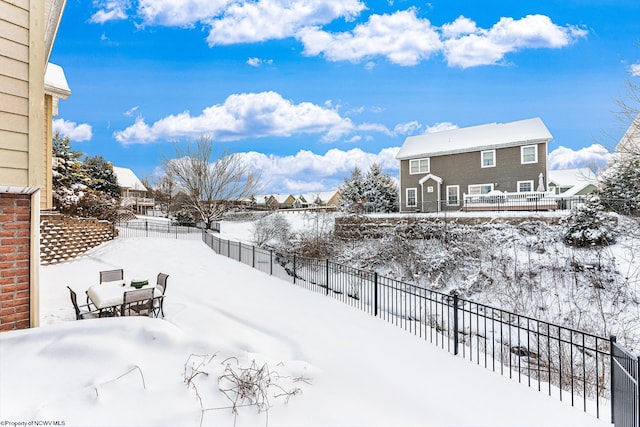 view of snowy yard