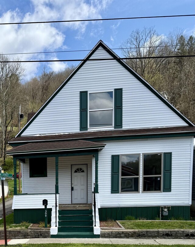 309 E Main St, Mannington, WV 26575 - bungalow-style house with covered porch