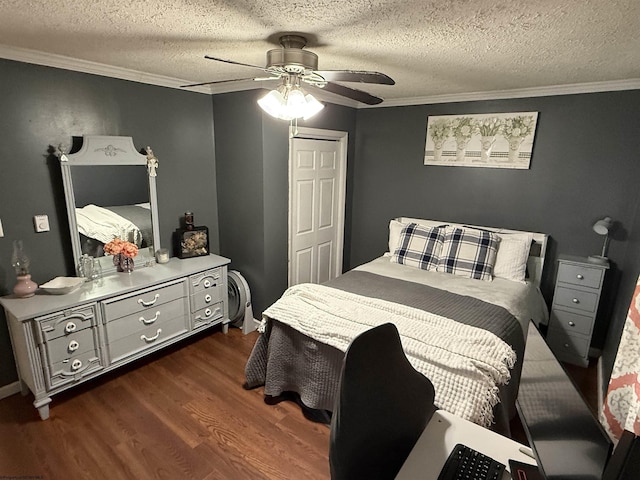 bedroom with ceiling fan, ornamental molding, dark hardwood / wood-style floors, and a textured ceiling