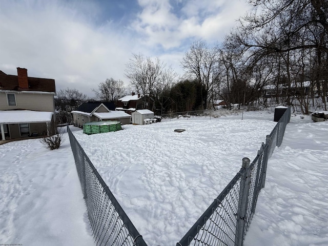 view of yard covered in snow