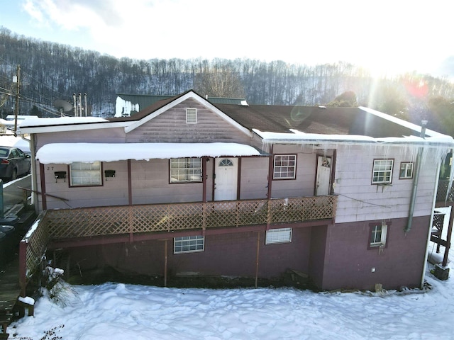 view of snow covered property