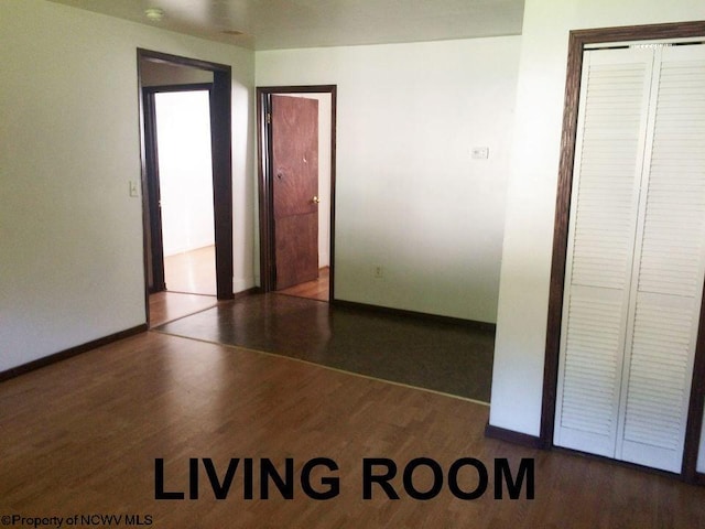 interior space with dark hardwood / wood-style flooring