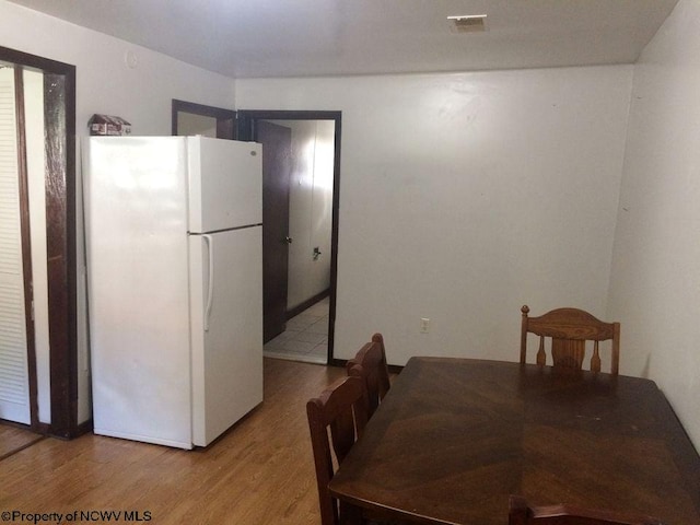 dining area featuring light hardwood / wood-style flooring