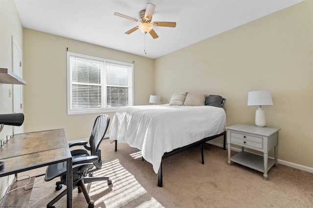 bedroom featuring light carpet and ceiling fan