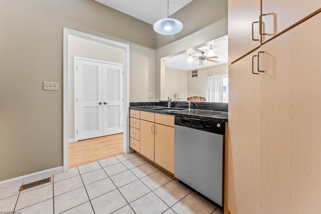 kitchen with pendant lighting, sink, ceiling fan, light tile patterned flooring, and stainless steel dishwasher