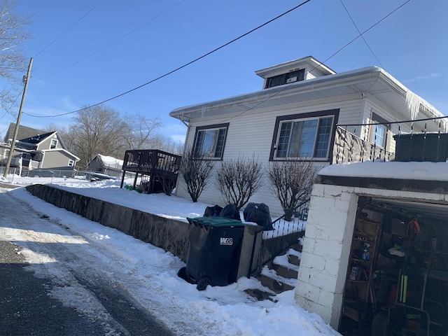 view of snow covered property