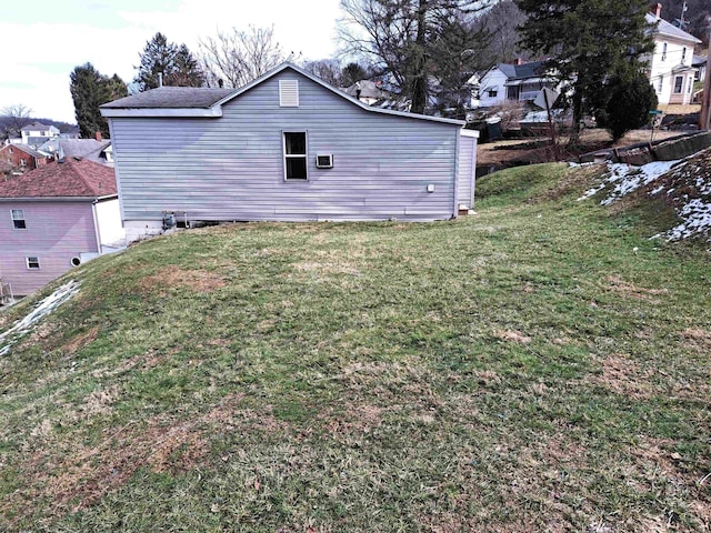 back of house with a yard