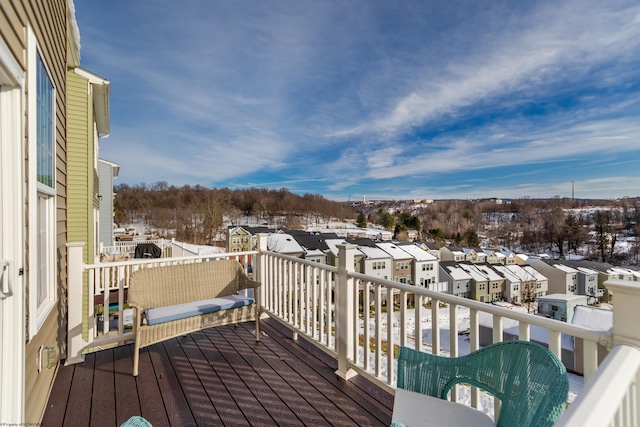 view of snow covered deck