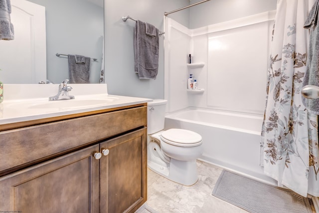 full bathroom with vanity, shower / tub combo, and toilet