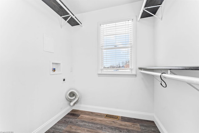 laundry area with dark hardwood / wood-style floors, hookup for a washing machine, and electric dryer hookup