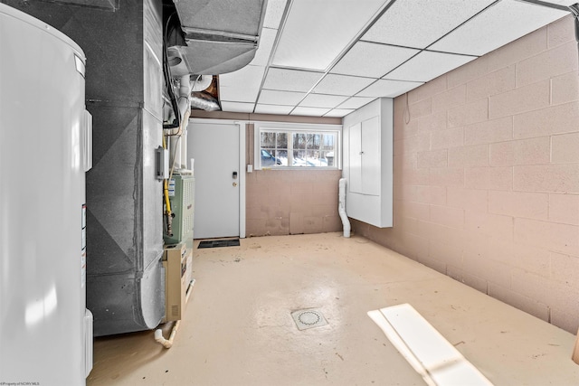 basement featuring a drop ceiling