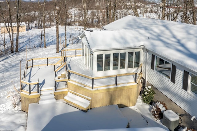 view of snow covered deck