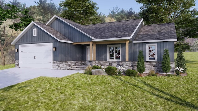 view of front of property with a garage and a front yard