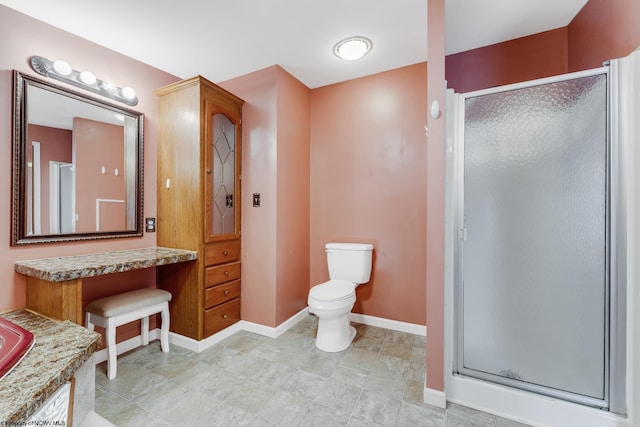 bathroom featuring walk in shower, vanity, and toilet