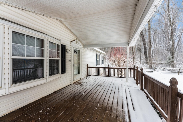 view of snow covered deck