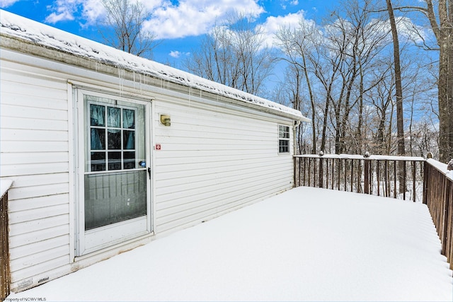 view of snow covered deck