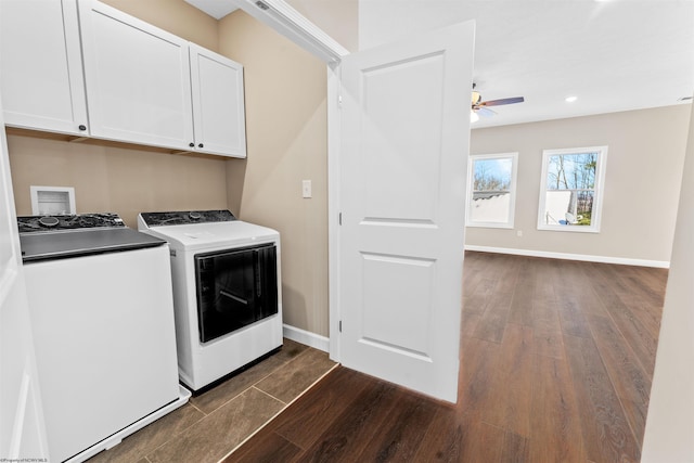 washroom with independent washer and dryer, cabinets, ceiling fan, and dark wood-type flooring