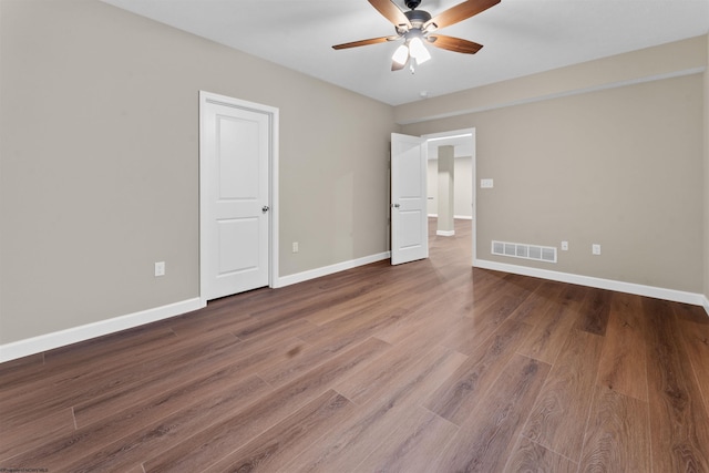 unfurnished bedroom featuring hardwood / wood-style floors and ceiling fan