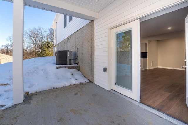 view of patio with central AC unit