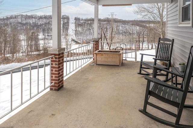 view of snow covered patio