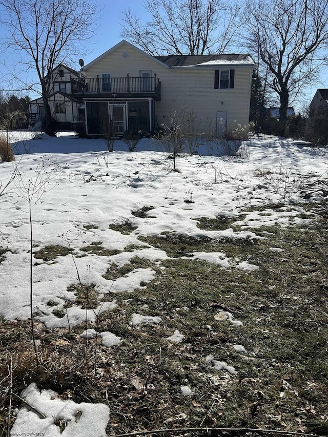 view of snow covered house