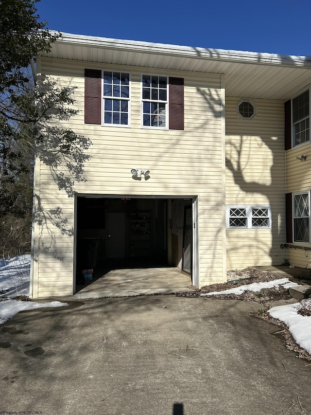 entrance to property featuring a garage