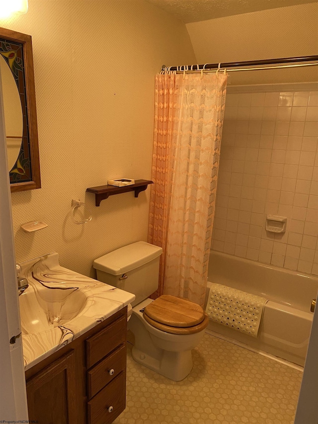 full bathroom with vanity, toilet, and shower / bath combo