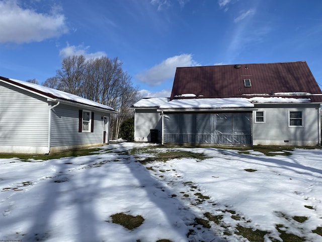 view of snow covered property