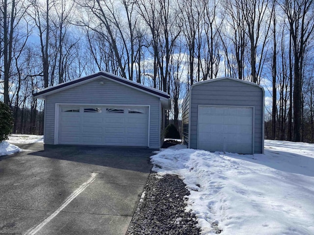 view of snow covered garage